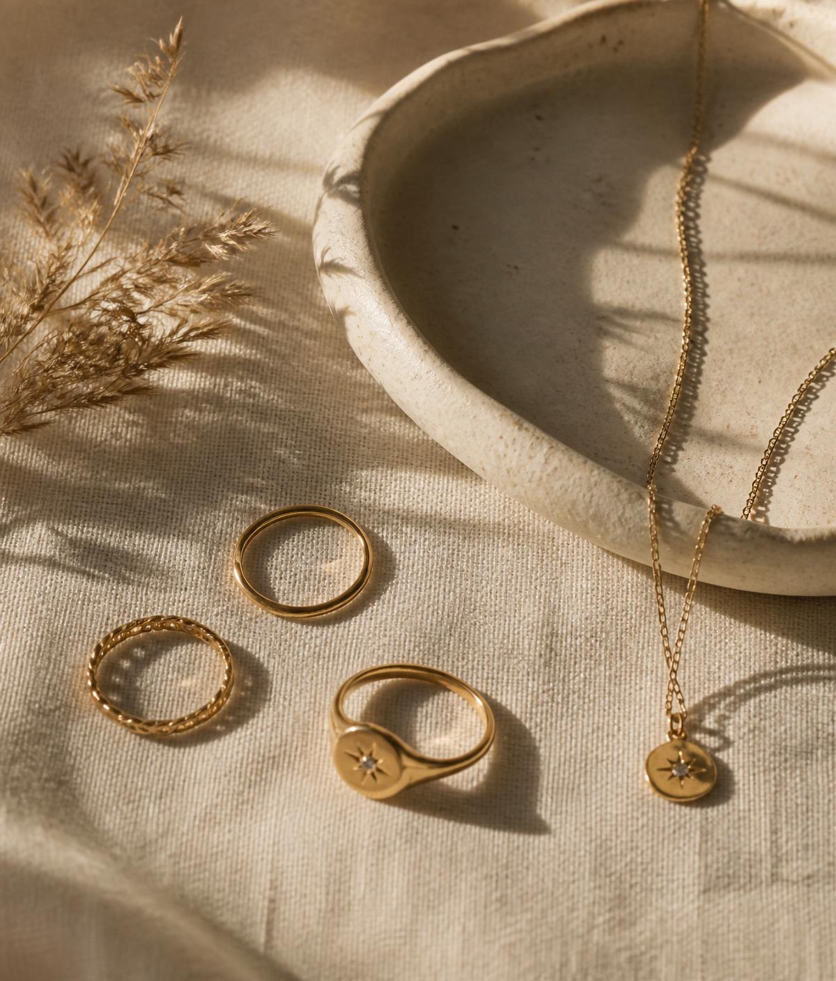 SHAURA pieces resting on fabric